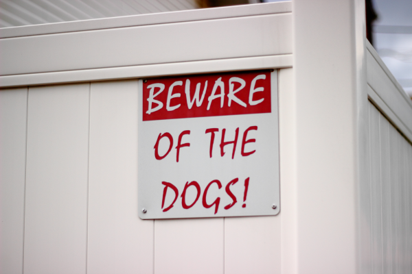 South African dog owners may still face legal liability after dog attacks despite displaying warning signs on their property.